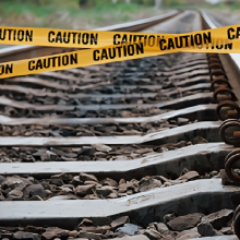 Railroad tracks with caution tape